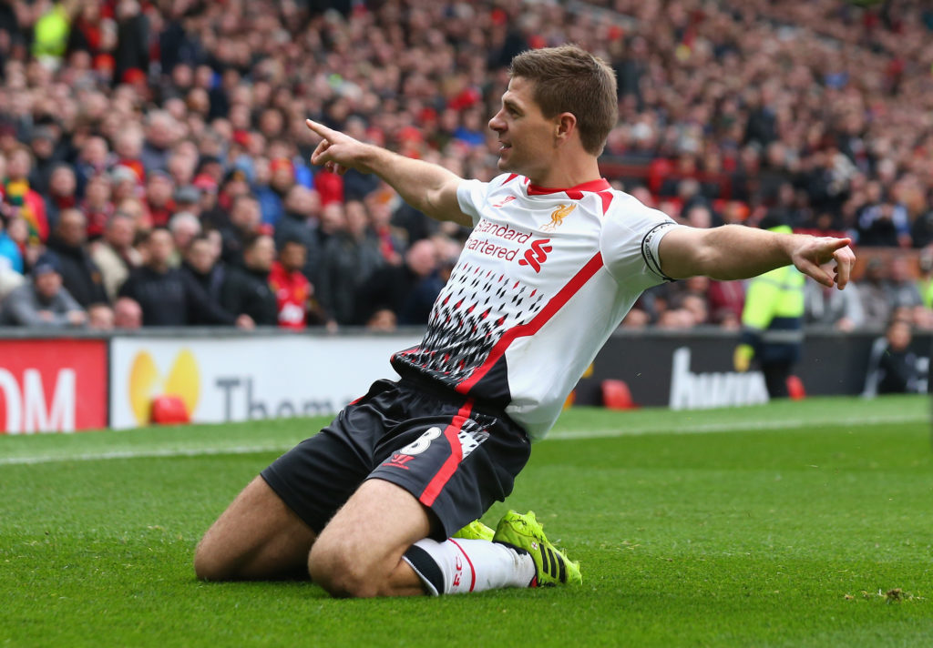 Steven Gerrard knee slides in celebration after scoring for Liverpool against Manchester United at Old Trafford