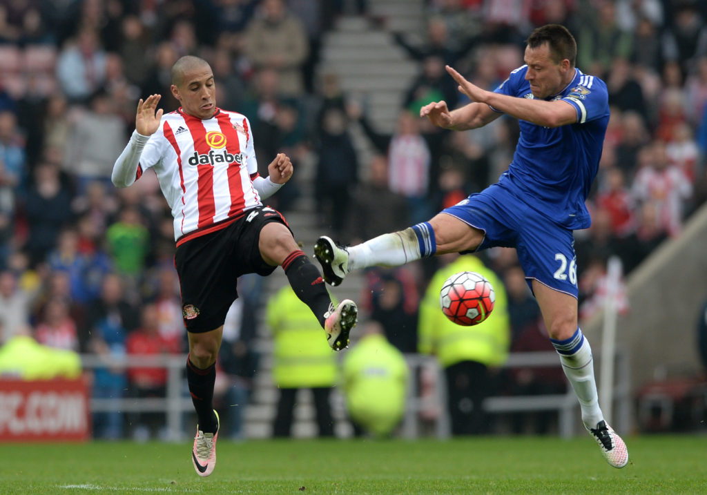 John Terry of Chelsea fouls Wahbi Khazri of Sunderland resutling in the second yellow card during the Barclays Premier League match between Sunderland and Chelsea at the Stadium of Light.