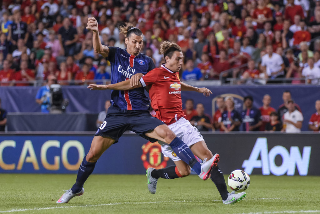 Former Manchester United defender Marnick Vermijl battles for the ball with Zlatan Ibrahimovic during a pre-season friendly in Chicago in 2015