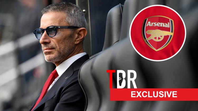 An image of Andrea Berta looking on during an Arsenal match with an Arsenal badge and a TBR Football exclusive banner