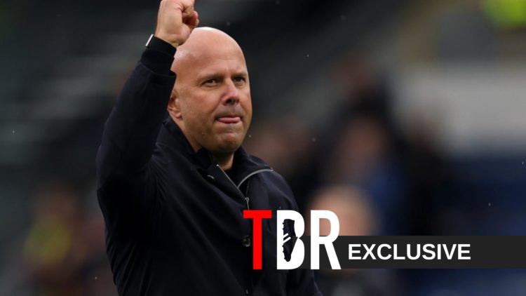 Arne Slot, Manager of Liverpool, celebrates after the team's victory during the Premier League match between Burnley and Liverpool at Turf Moor.