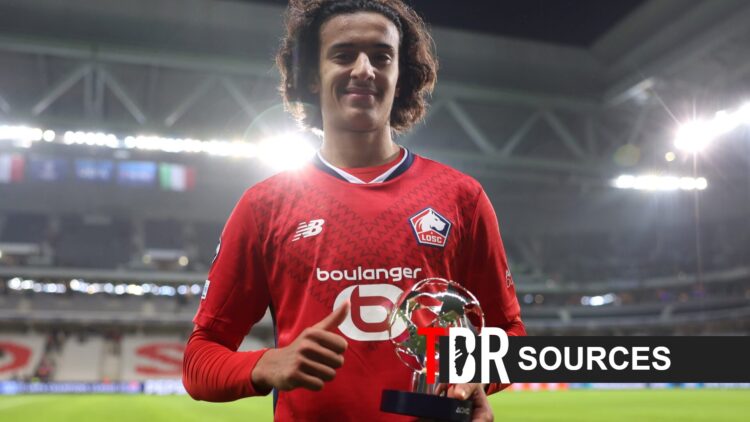 Ayyoub Bouaddi of Lille holds up Champions League man of the match award