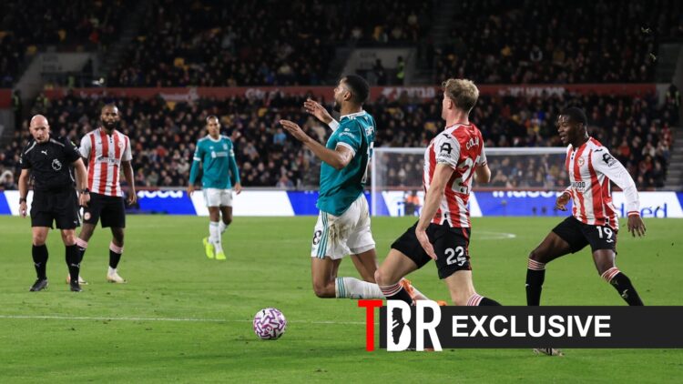 Cody Gakpo of Liverpool falls down in the box during Liverpool vs Brentford