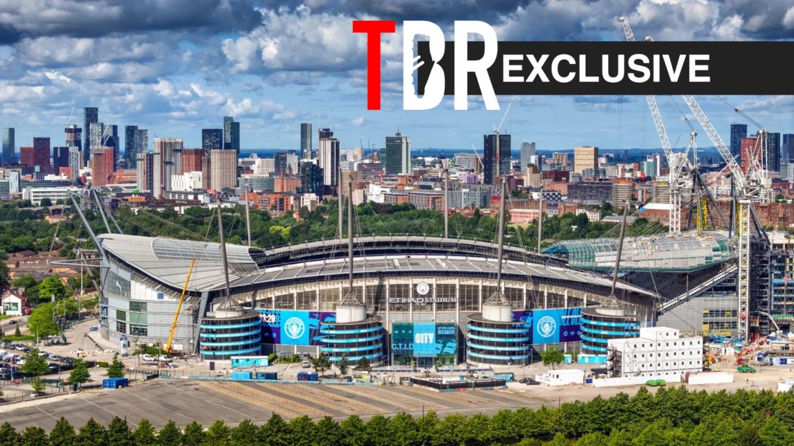 Aerial view of Manchester City's Etihad Stadium, TBR logo and exclusive label inset
