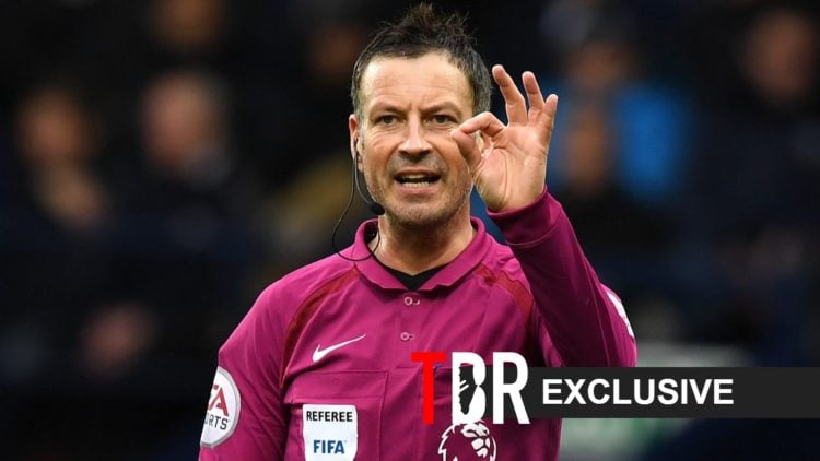 Mark Clattenburg looks on