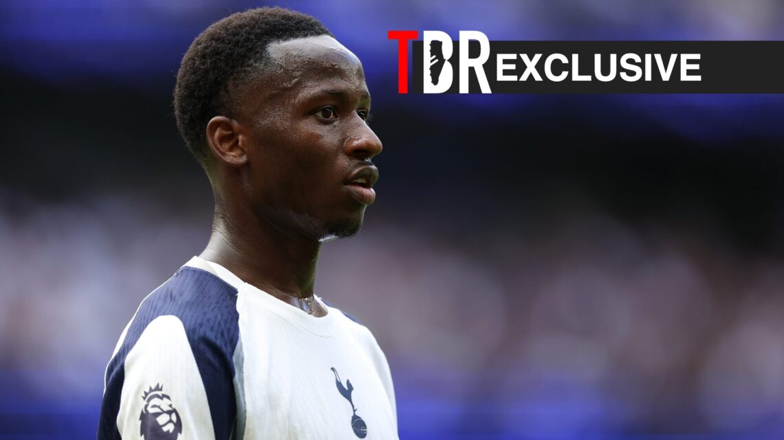 Pape Sarr in action for Tottenham during a Premier League clash against Bournemouth, TBR logo and exclusive label inset