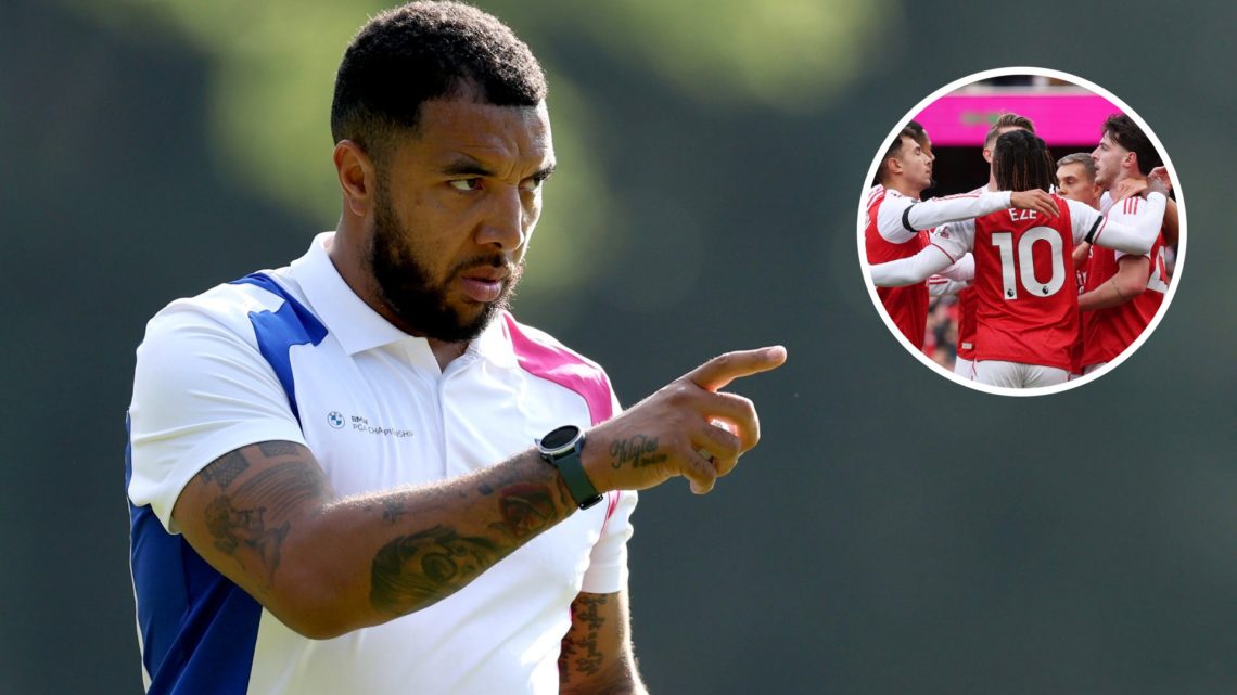 Troy Deeney points during a BMW PGA golfing event alongside an image of the Arsenal squad celebrating