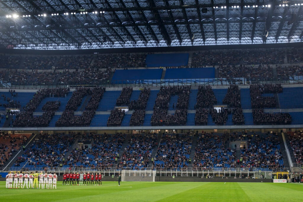 Fans of AC Milan in sector 'Curva Sud' display the message '