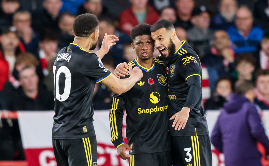 Manchester United players celebrate scoring against Nottingham Forest
