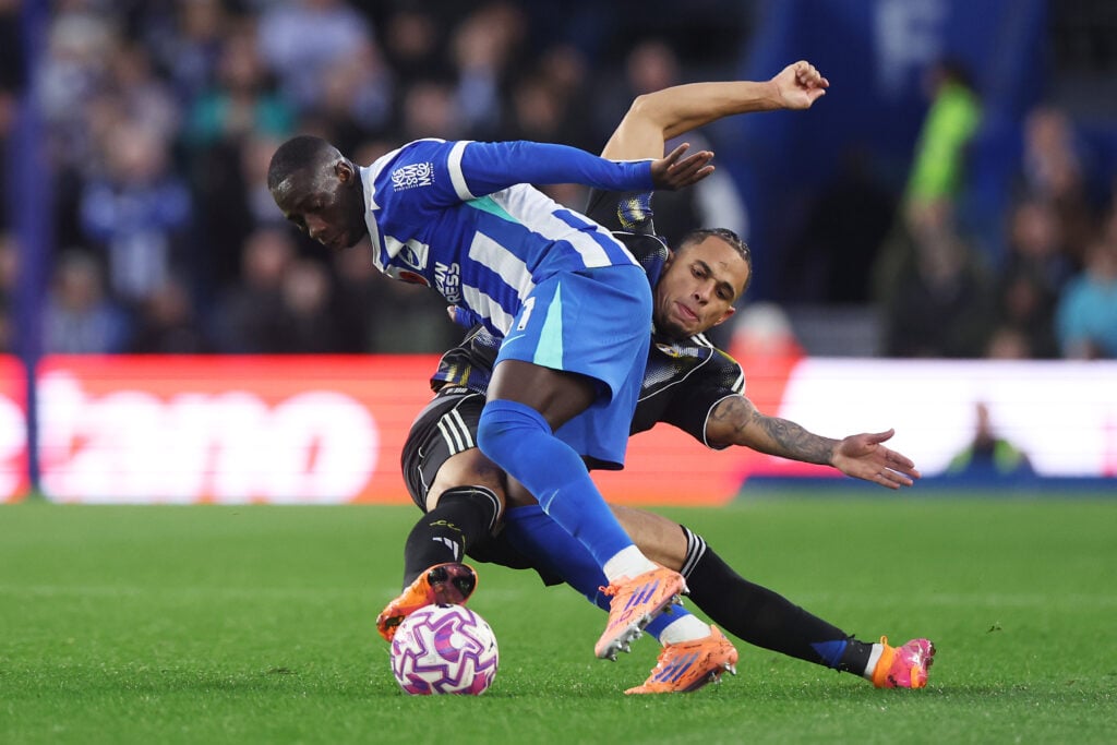 Yankuba Minteh battles for the ball during Brighton vs Leeds