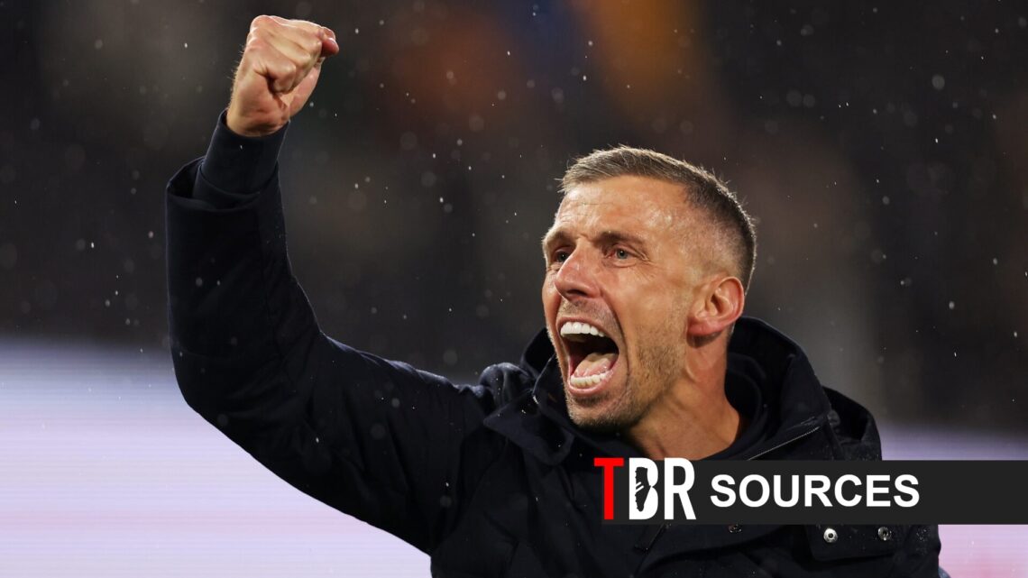 Gary O'Neil celebrates with his fist in the air