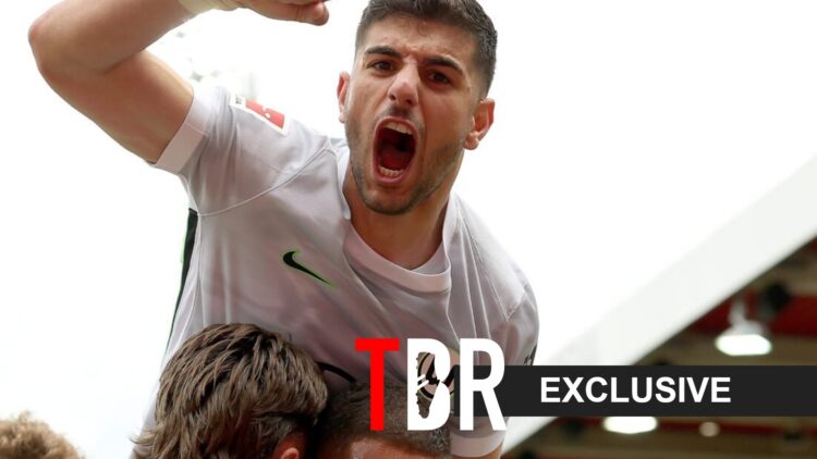 Konstantinos Koulierakis celebrates goal for Wolfsburg.