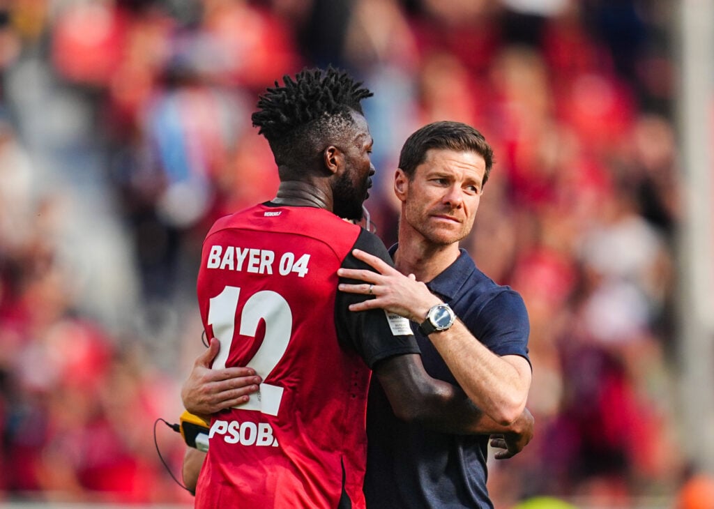 Xabi Alonso embracing Edmond Tapsoba