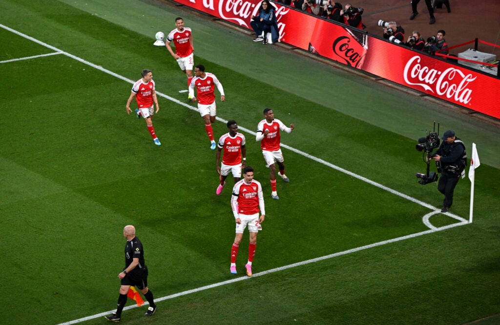 Arsenal players celebrate after scoring against Burnley in the Premier League